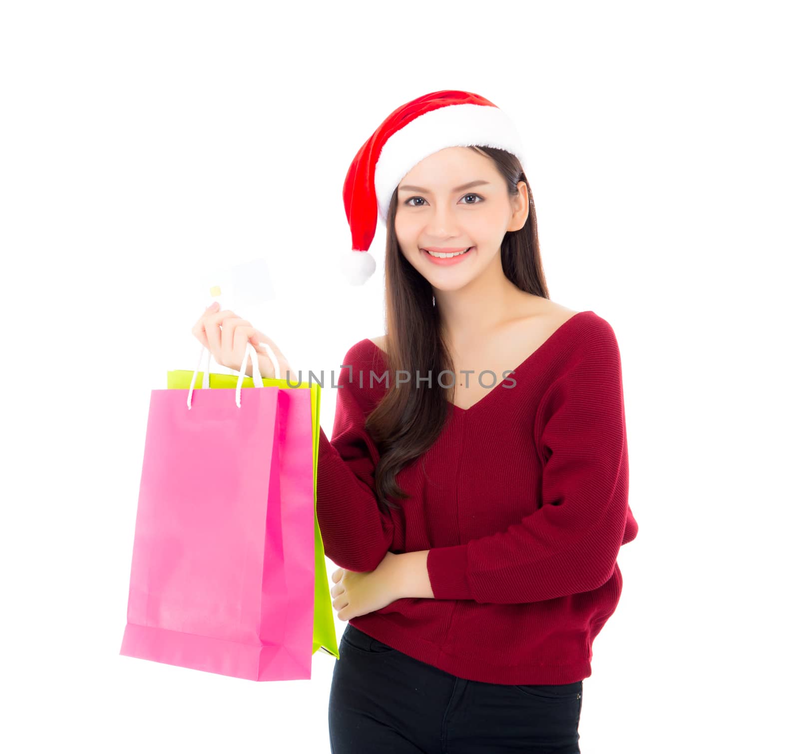 Happy fashion asian woman with smile holding shopping paper bag and credit card, Sale and christmas with holiday, girl with buyer enjoy and excited isolated on white background, season concept.
