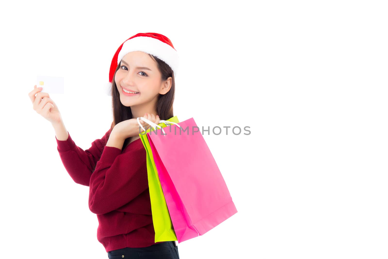 Happy fashion asian woman with smile holding shopping paper bag and credit card, Sale and christmas with holiday, girl with buyer enjoy and excited isolated on white background, season concept.