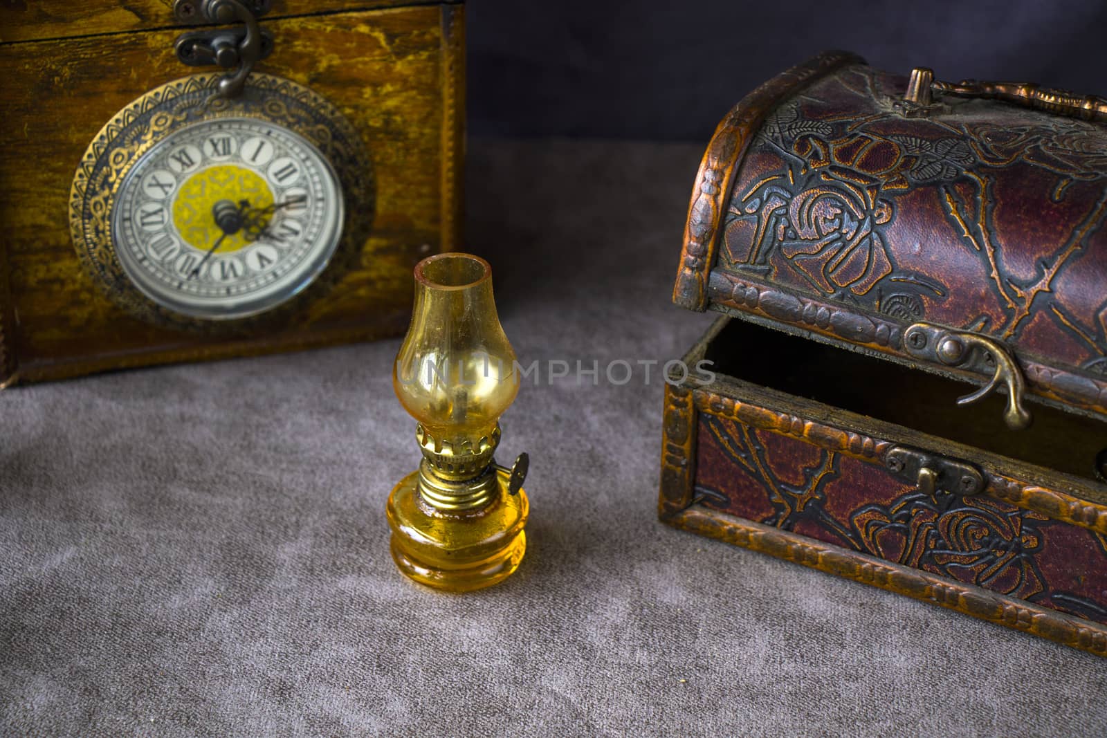 Vintage objects on the table, old box and lamp
