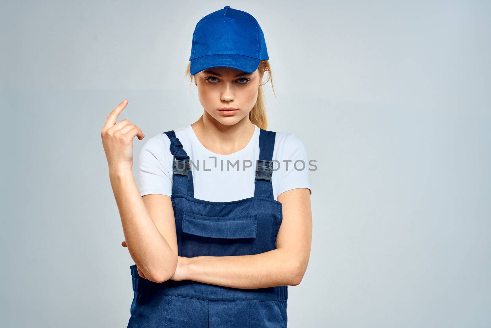 Working woman in uniform courier delivery service lifestyle by SHOTPRIME