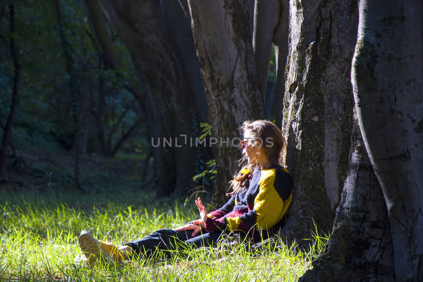 Woman in the botanic garden and park, trees and casual young girl portrait in garden
