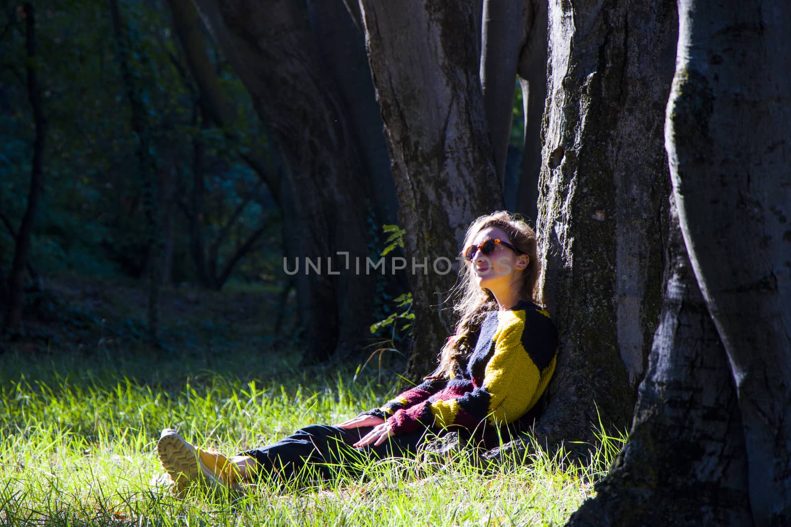 Woman in the botanic garden and park, trees and casual young girl portrait by Taidundua
