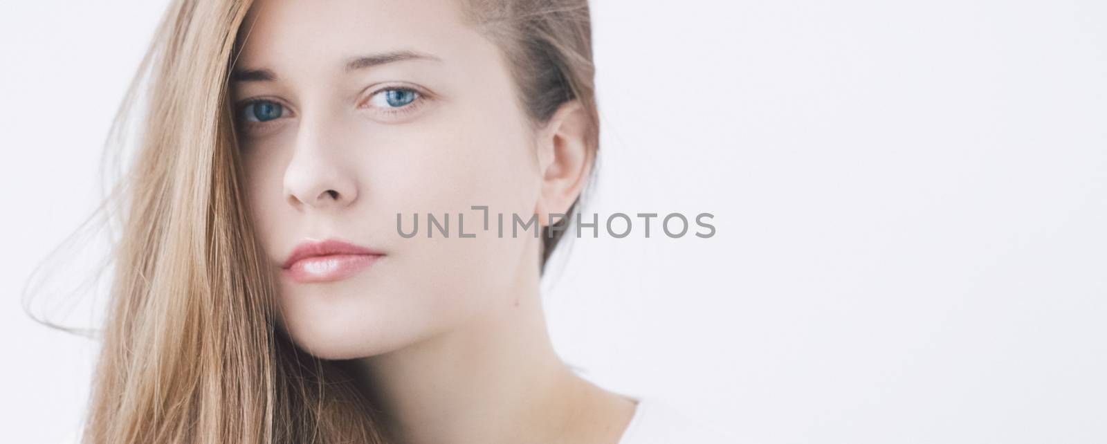 Beauty face portrait of a young woman, natural makeup look, skin by Anneleven