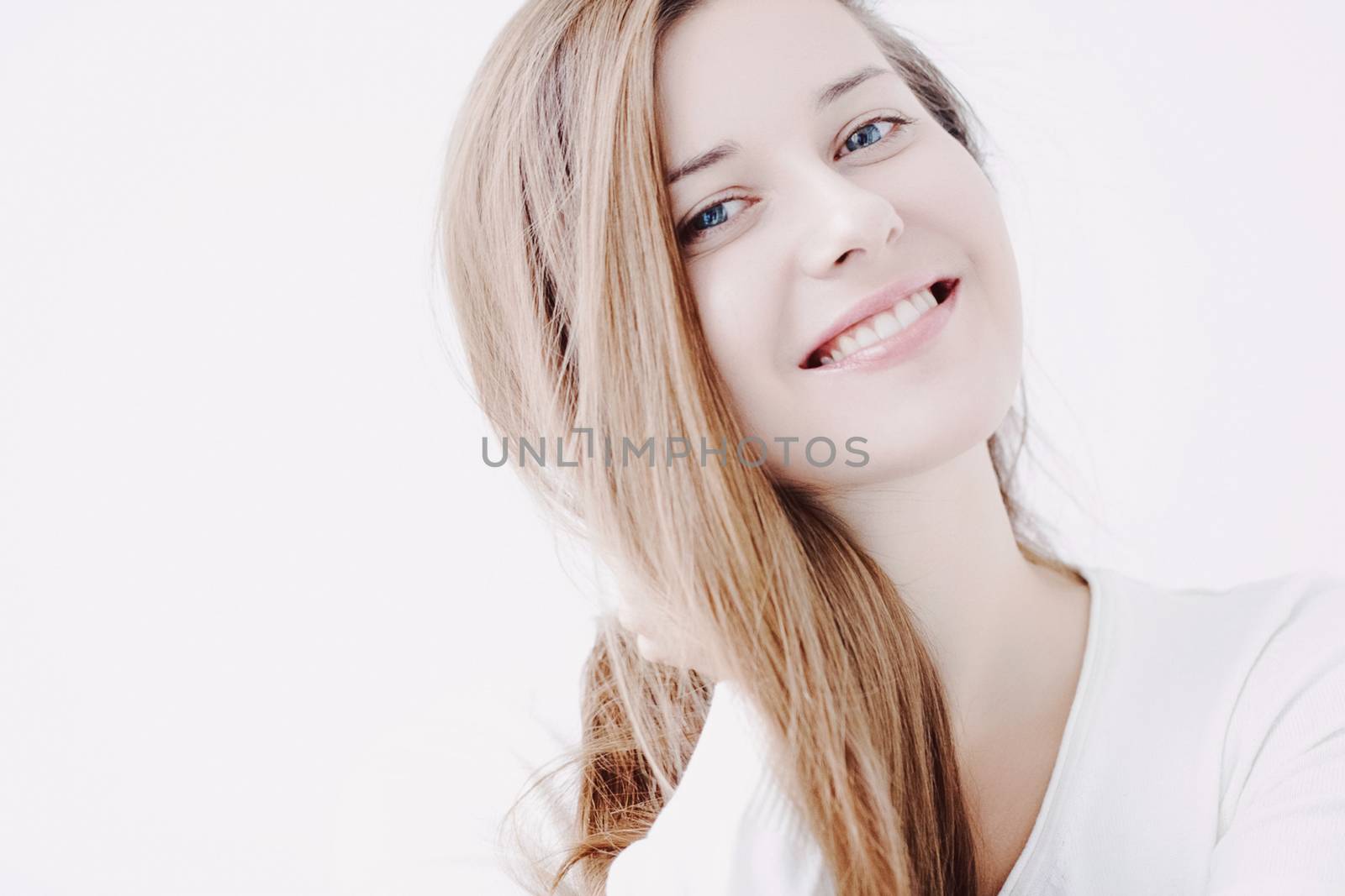 Beauty face portrait of a young woman, natural makeup look, skincare and hair care brand