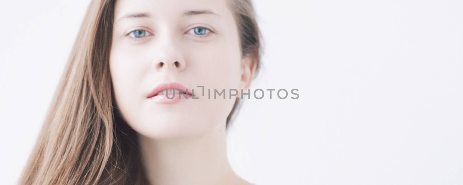 Beauty face portrait of a young woman, natural makeup look, skin by Anneleven