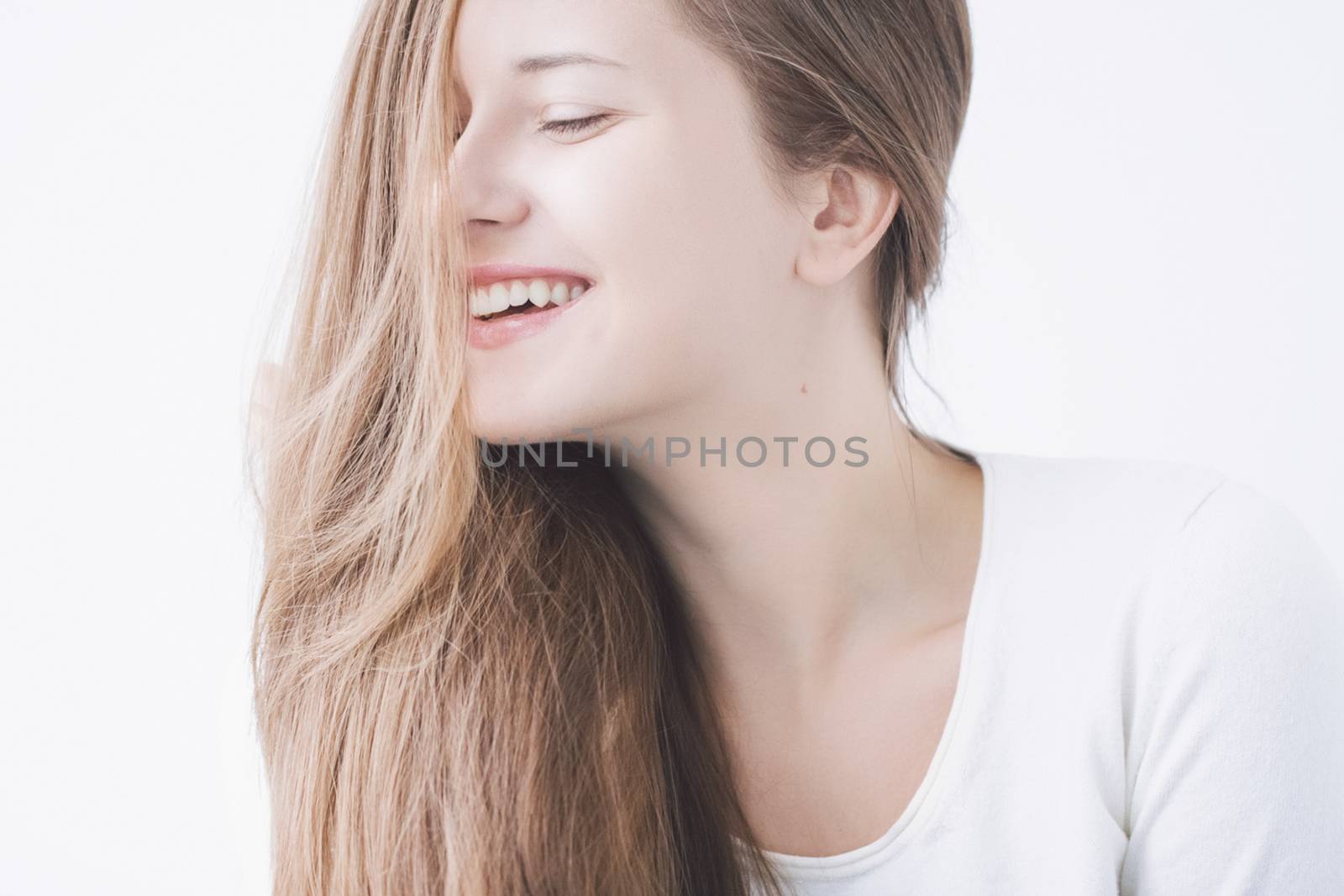 Beauty face portrait of a young woman, natural makeup look, skincare and hair care brand