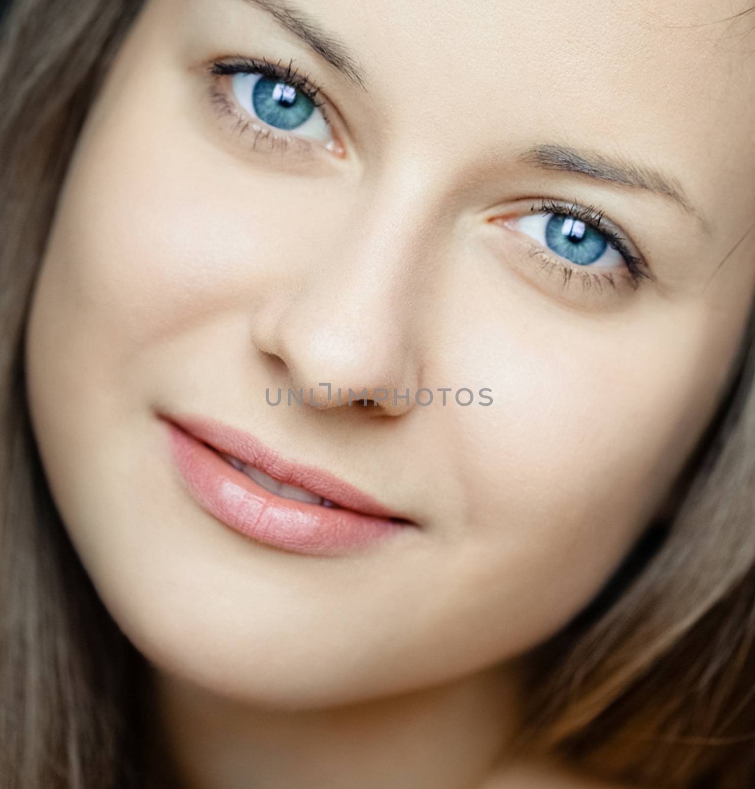 Beauty face portrait of a young woman, natural makeup look, skincare and cosmetics