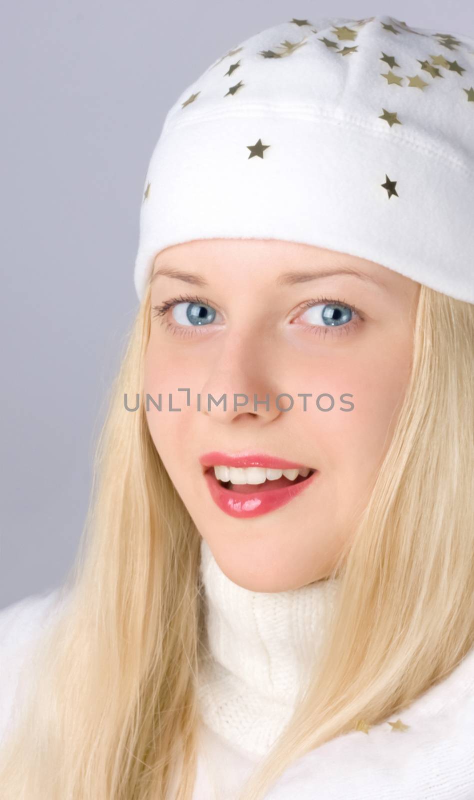 Beautiful blonde girl in Christmas time, woman with positive emo by Anneleven