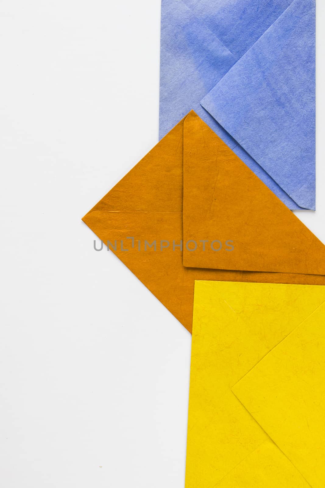 Colorful three envelope on the white background by Taidundua