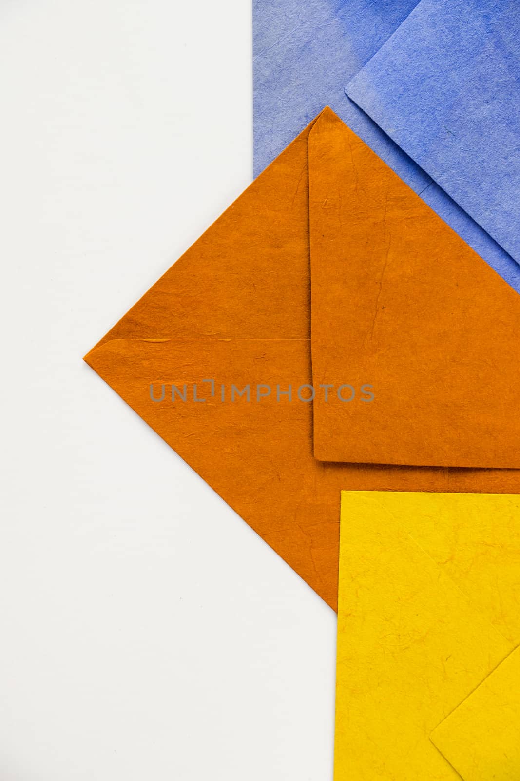Colorful three envelope on the white background by Taidundua