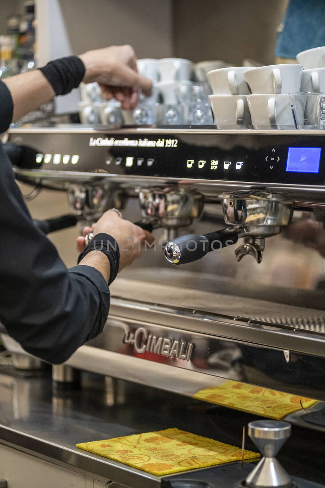 terni,italy october 20 2020:barista preparing coffee at the machine