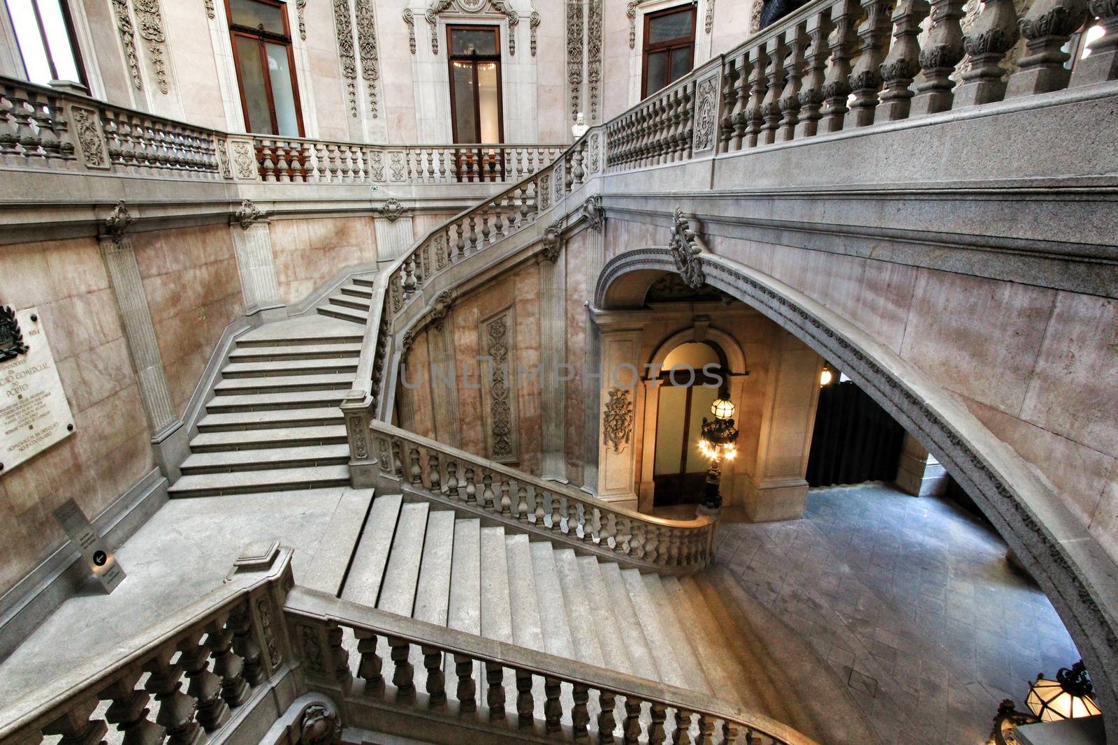 Porto, Portugal- January 6, 2020: Beautiful and sumptuous stairway built in 1868 by Goncalves e Sousa of the Stock Exchange Palace in Porto
