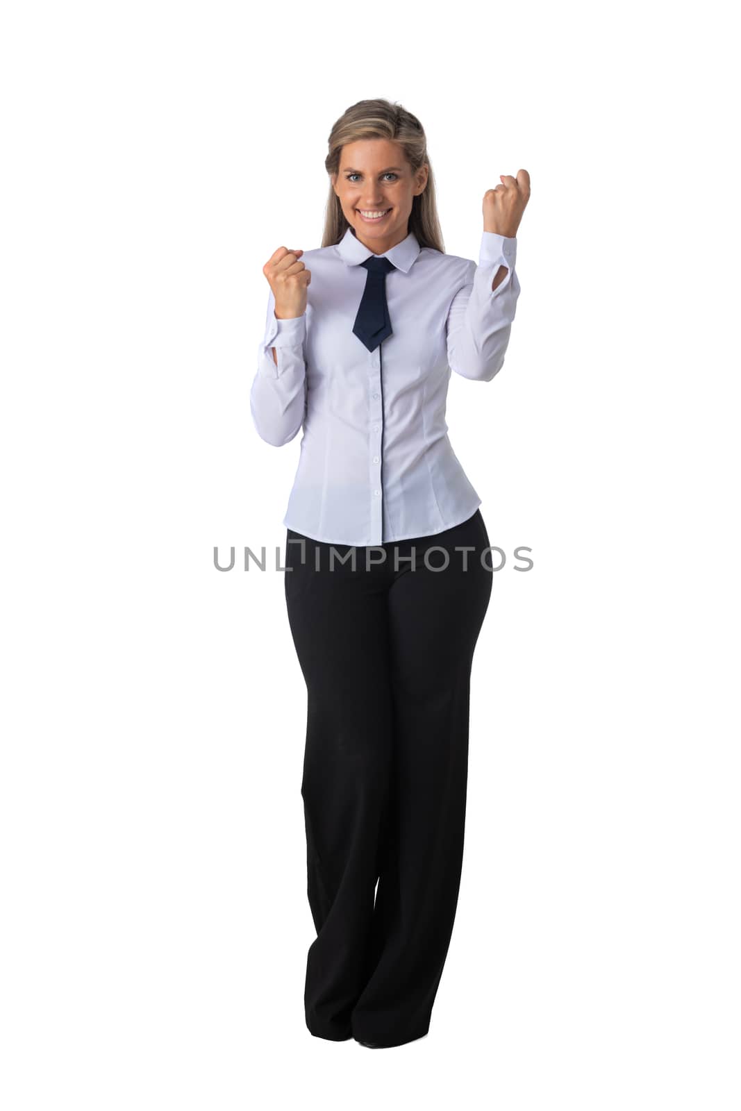 Young business woman winner holding fists isolated on white background full length studio portrait