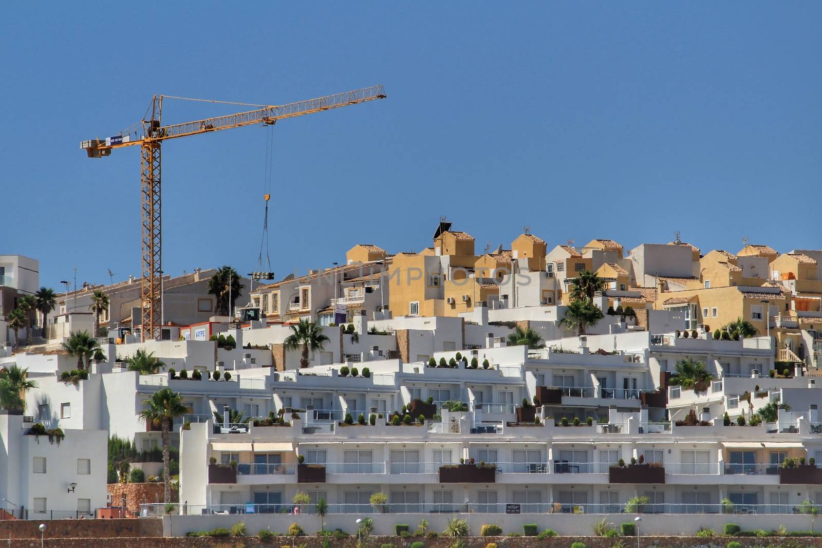 Alicante, Spain- July 28, 2020: Houses under construction in the urbanization of Gran Alacant in southern Spain