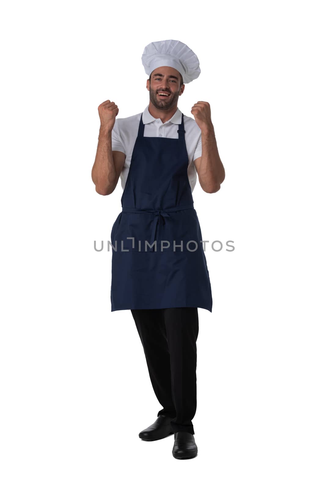 Male cook in apron and hat holding fists isolated on white background full length studio portrait