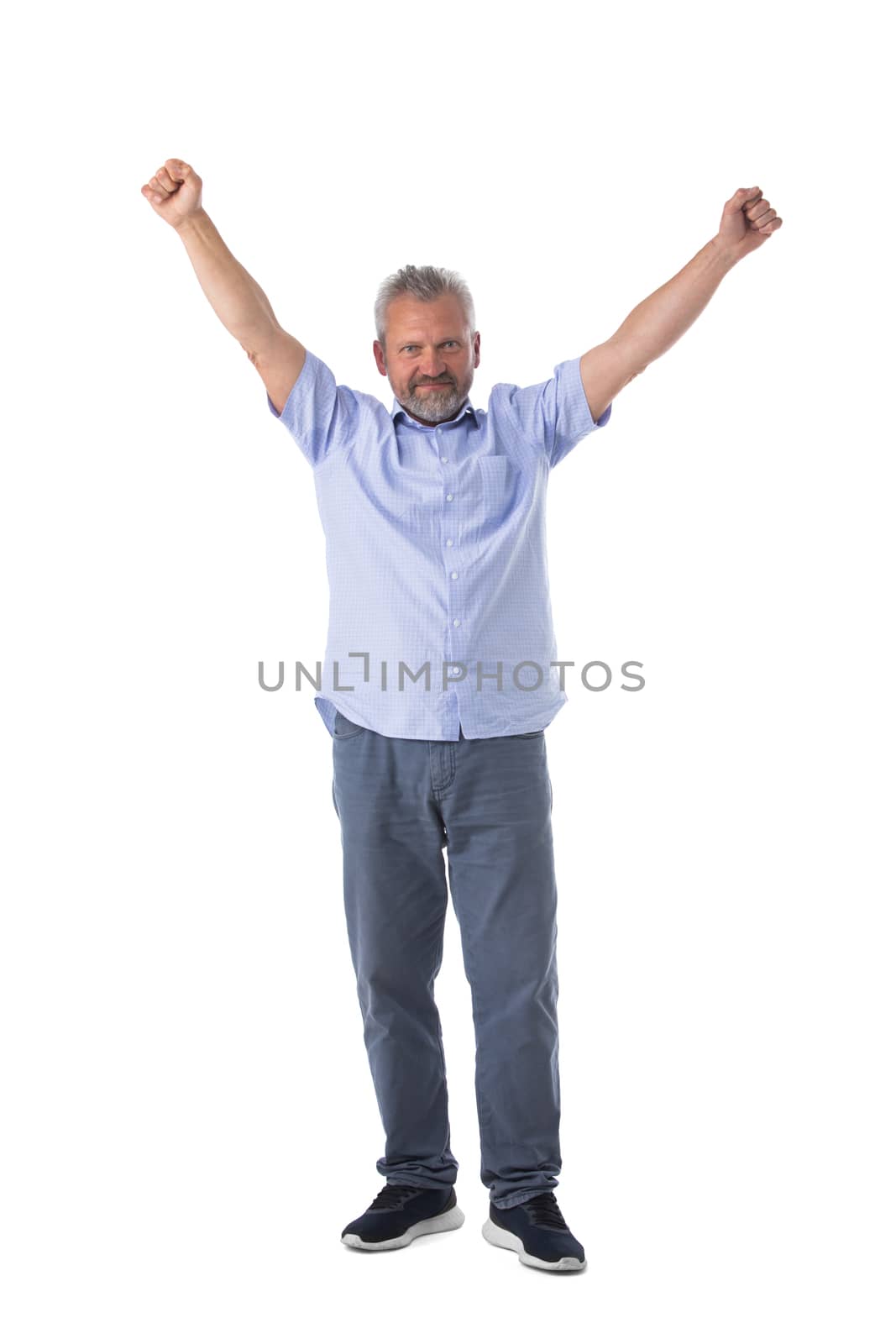 Senior business man winner with raised arms isolated on white background full length studio portrait