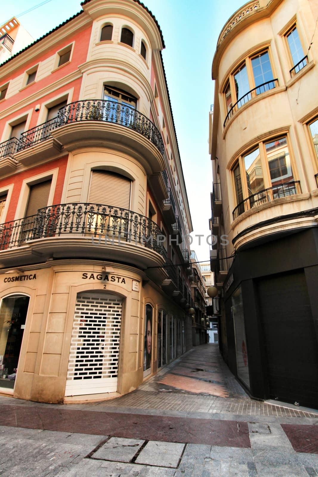 Elche, Alicante, Spain- September 9, 2020: Streets, majestic facades, windows and balconies of Elche city. Alicante province, Spain.