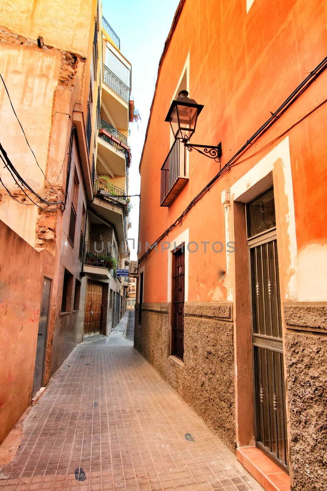 Elche, Alicante, Spain- September 9, 2020: Streets, majestic facades, windows and balconies of Elche city. Alicante province, Spain.