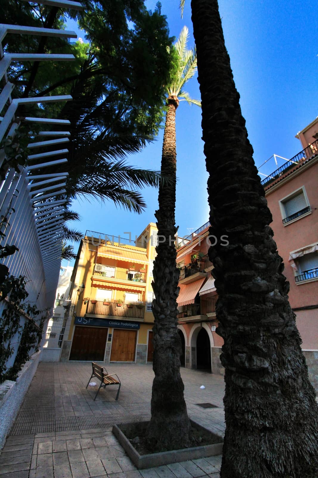Elche, Alicante, Spain- September 9, 2020: Streets, majestic facades, windows and balconies of Elche city. Alicante province, Spain.