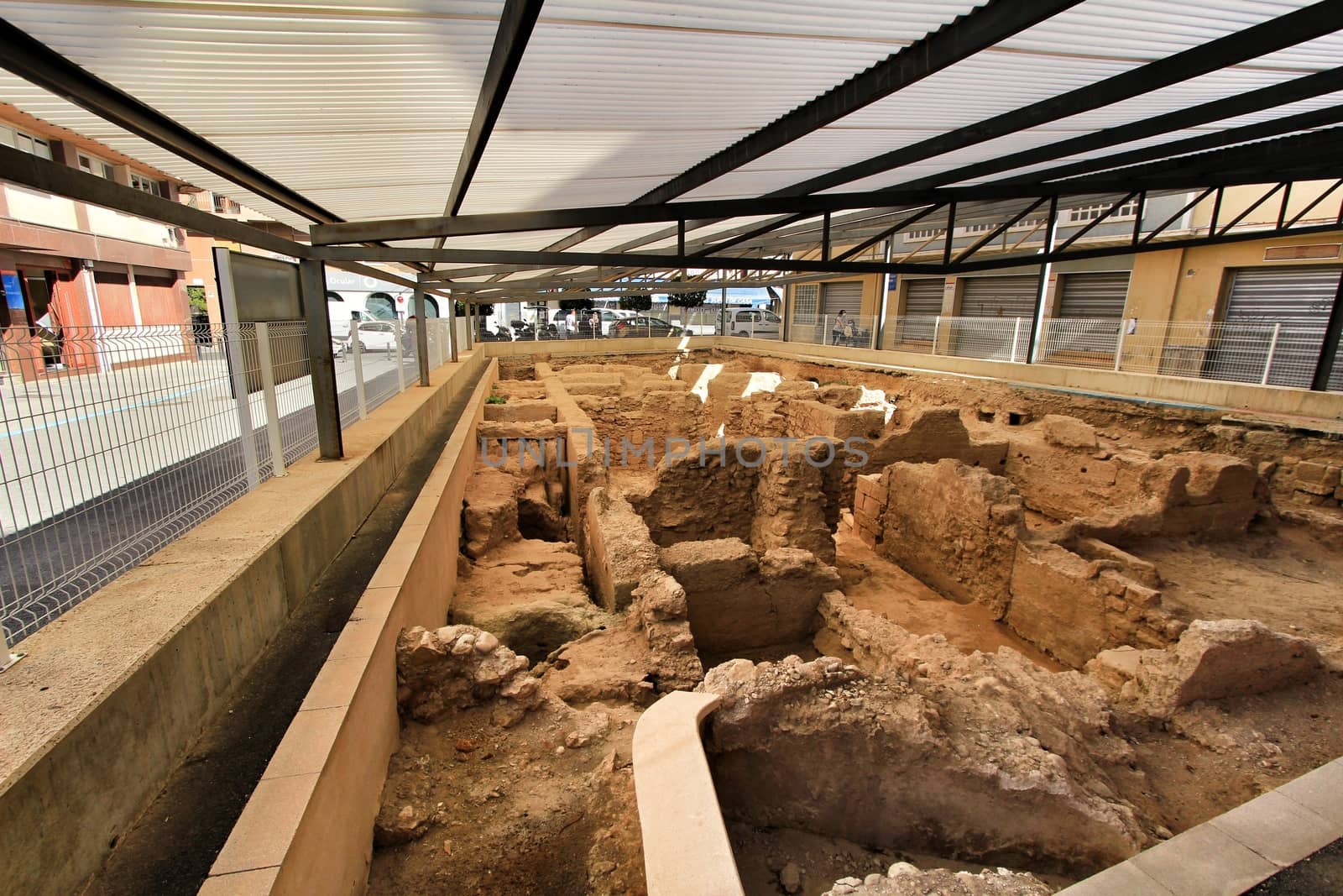 Elche, Alicante, Spain- October 7, 2020: Archeological remains found in the Fruita Square next to the old Municipal Market of Elche.