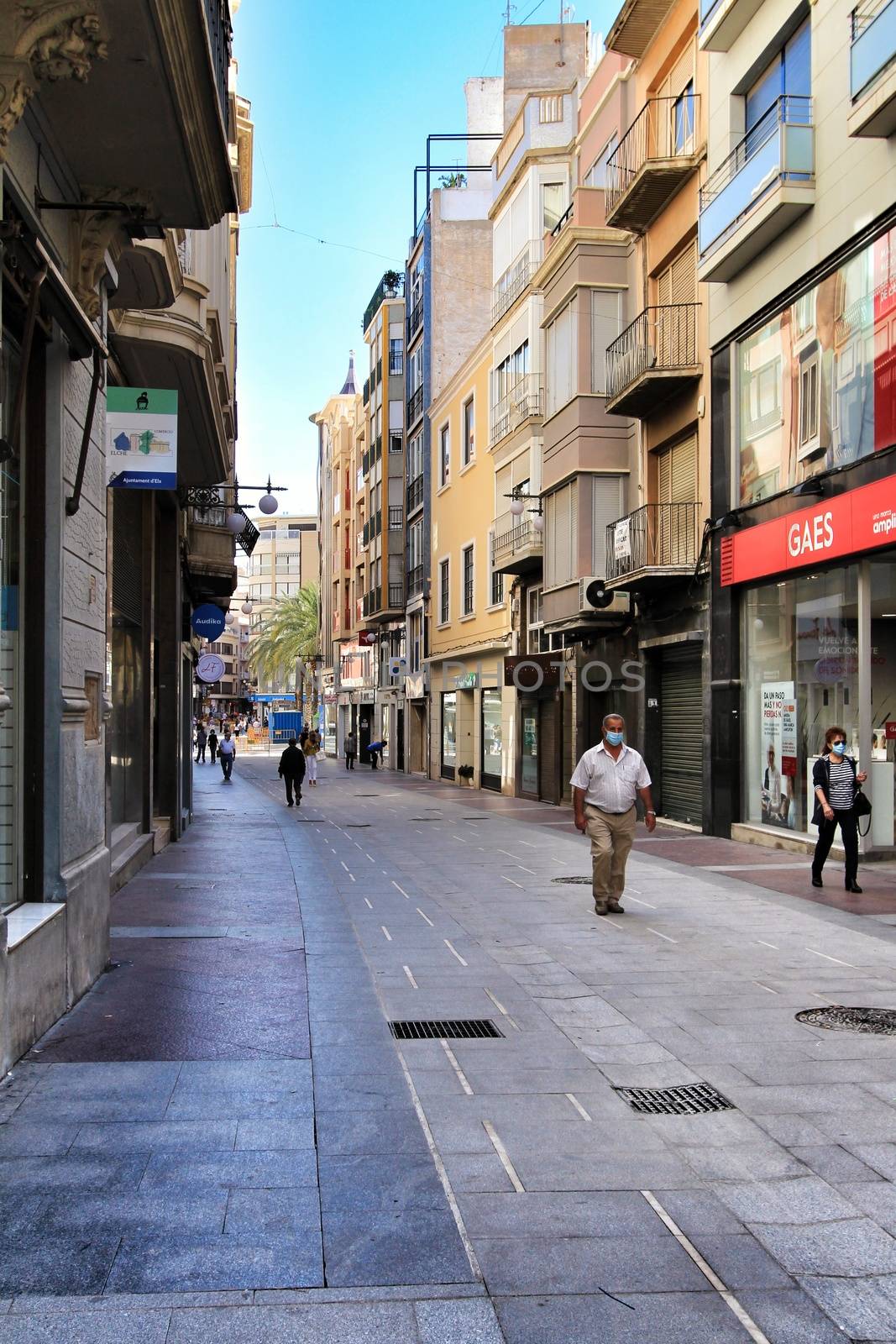 Elche, Alicante, Spain- October 7, 2020: Pedestrian street called Corredora plenty of shops in the center of the city of Elche in the morning