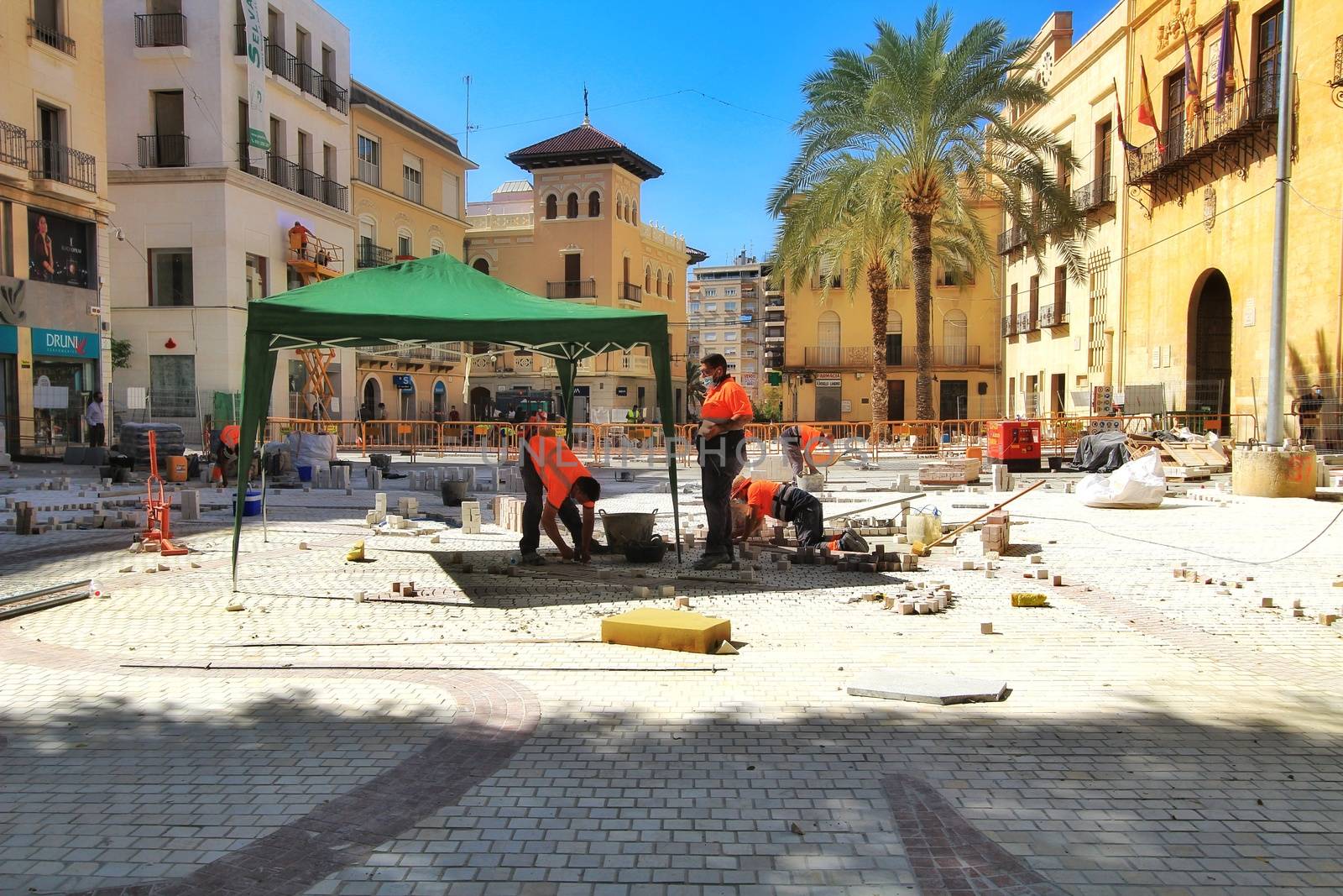 Elche, Alicante, Spain- October 7, 2020: Pedestrianization works at the Town Hall square in Elche, Alicante in Autumn