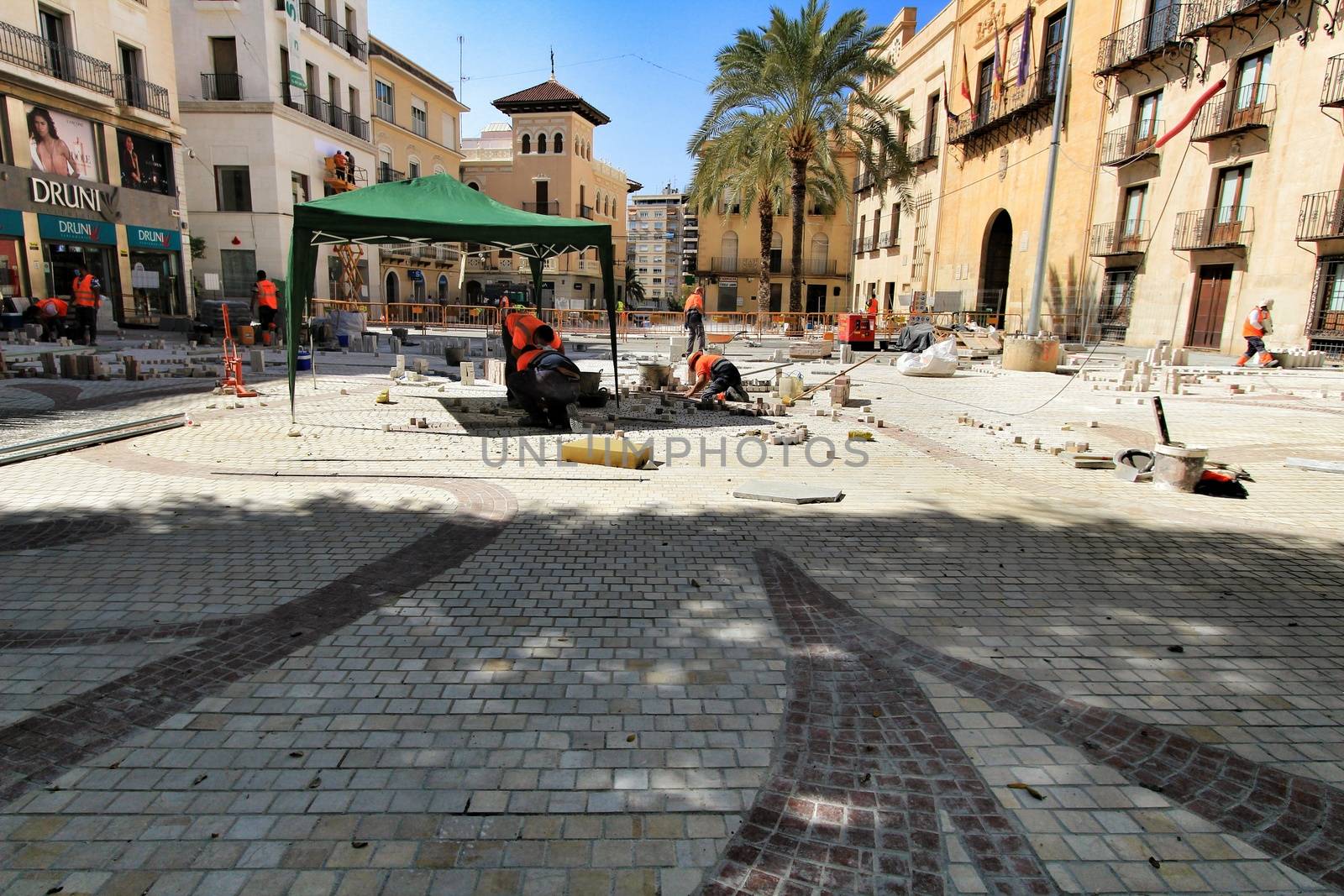 Elche, Alicante, Spain- October 7, 2020: Pedestrianization works at the Town Hall square in Elche, Alicante in Autumn