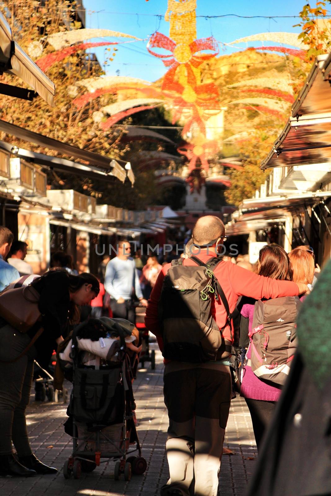 Jijona, Alicante, Spain- December 9, 2018: People walking and buying traditional nougat at the Jijona Christmas Fair