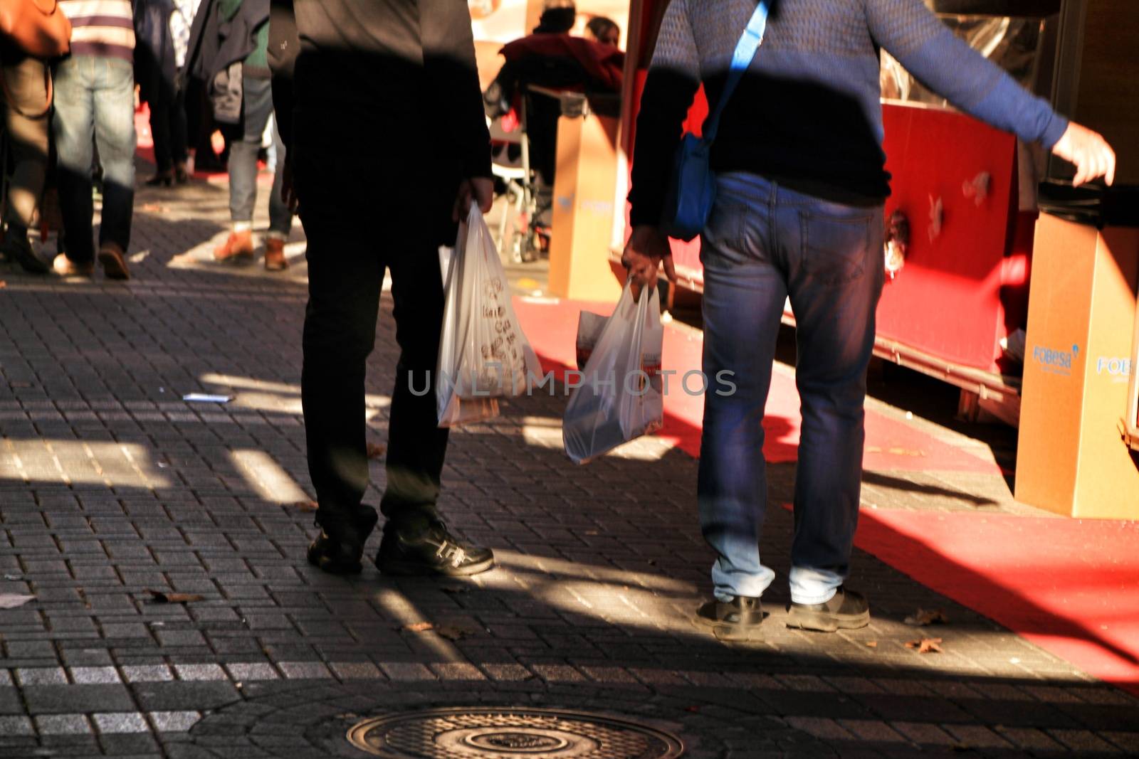 Jijona, Alicante, Spain- December 9, 2018: People walking and buying traditional nougat at the Jijona Christmas Fair