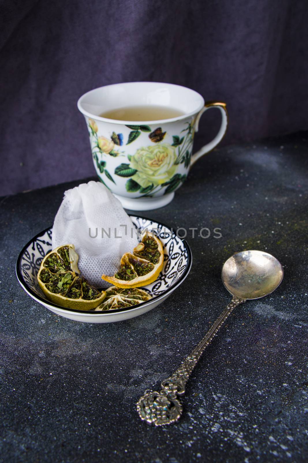 Set of tea, vintage silver spoons, various of tea and cup of tea by Taidundua