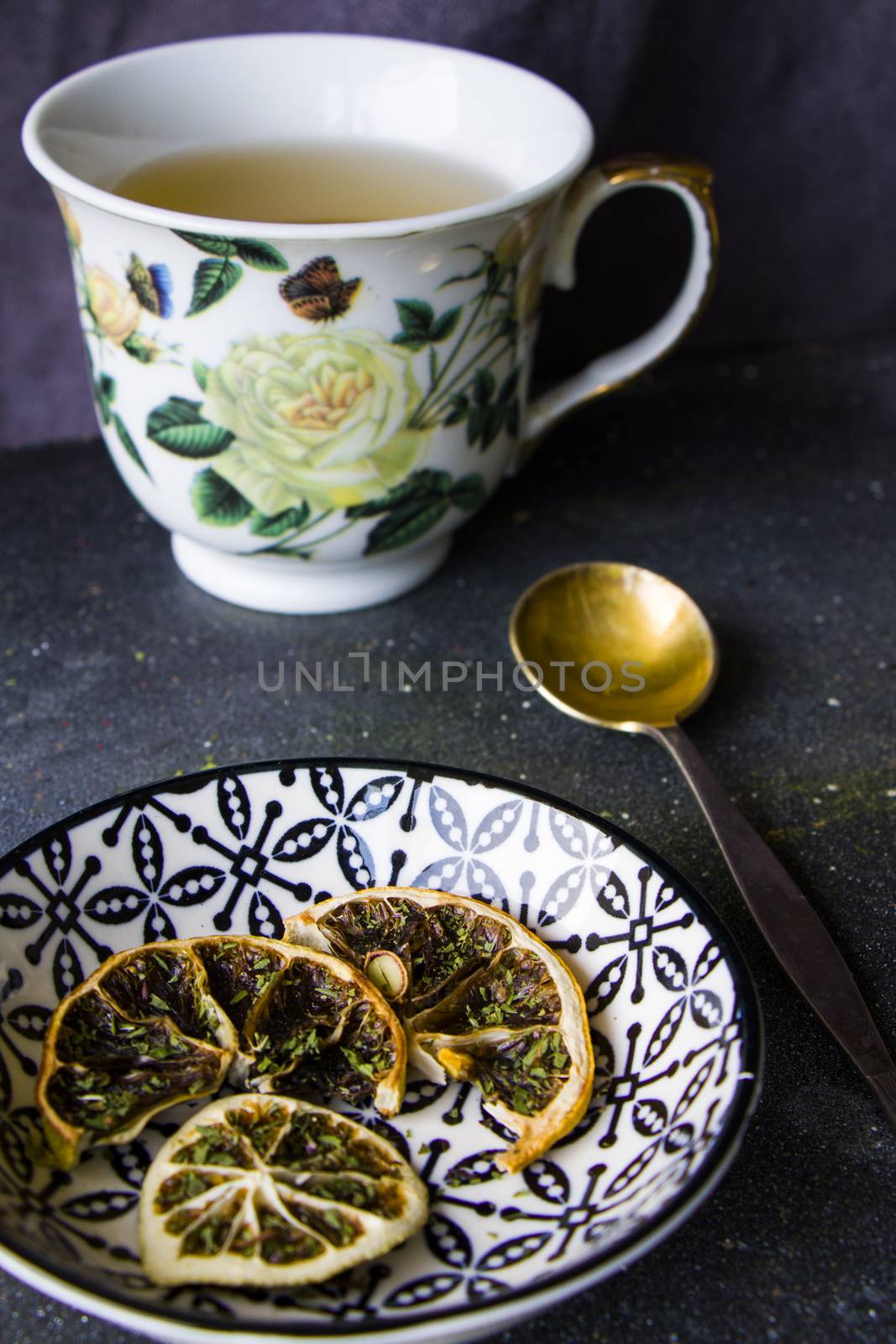 Set of tea, vintage silver spoons, various of tea and cup of tea by Taidundua