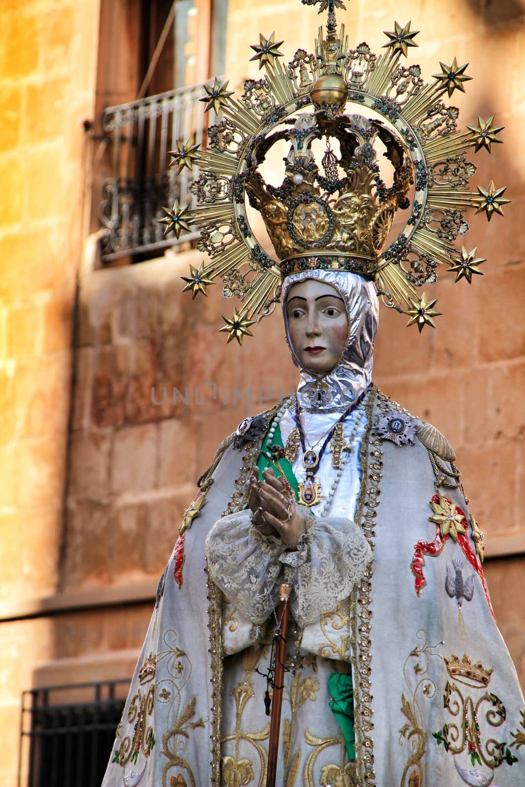 Elche, Alicante, Spain- December 29, 2019: Virgin of the Assumption accompanied by parishioners in procession for the streets of Elche for its festivity
