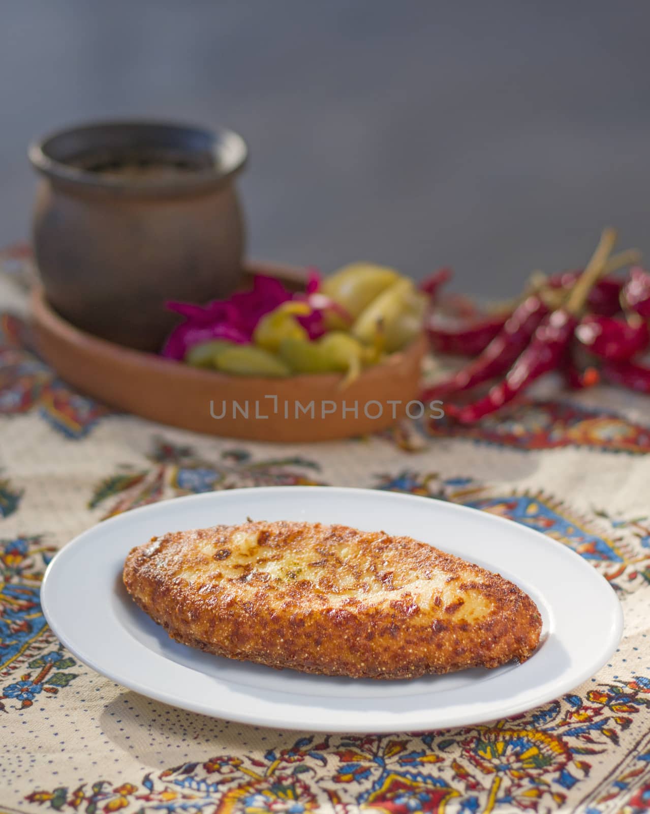 Georgian traditional food Chvishtari, corn meal with cheese and corn. Baked and ready to eat. Tbilisi, Georgia.