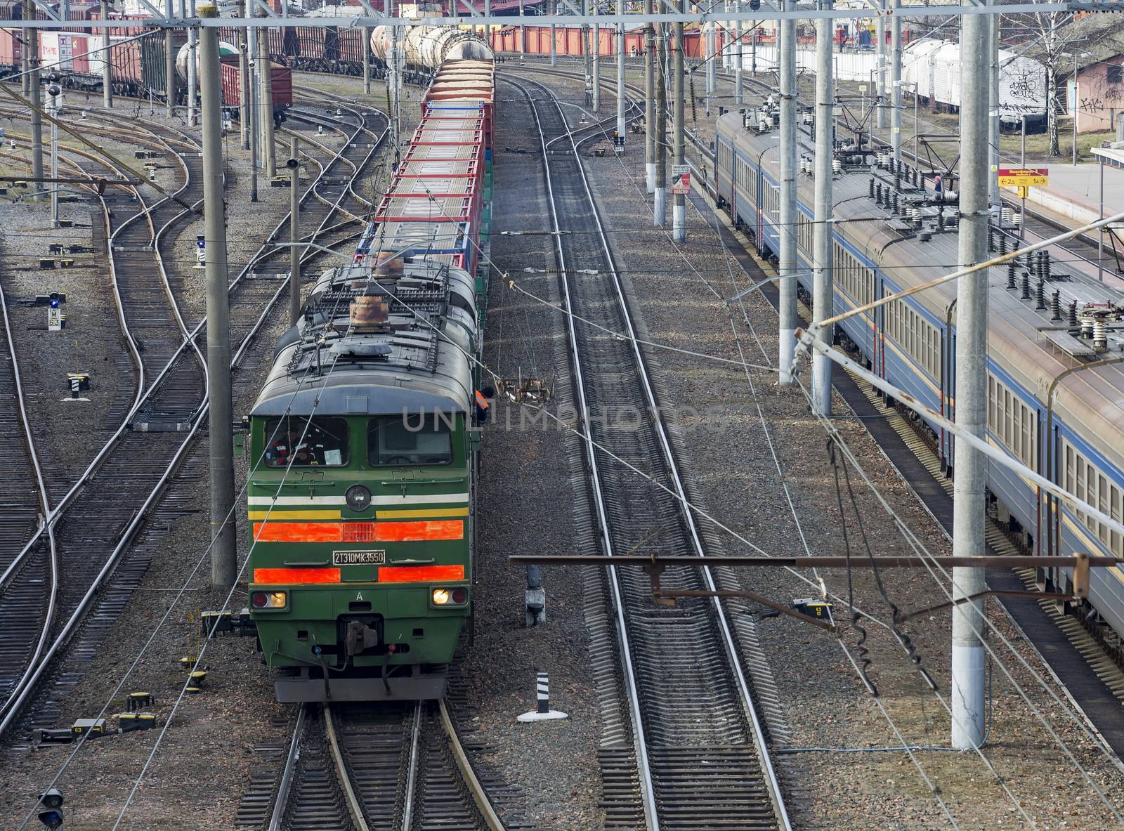 Freight train on the railway track branching by Grommik