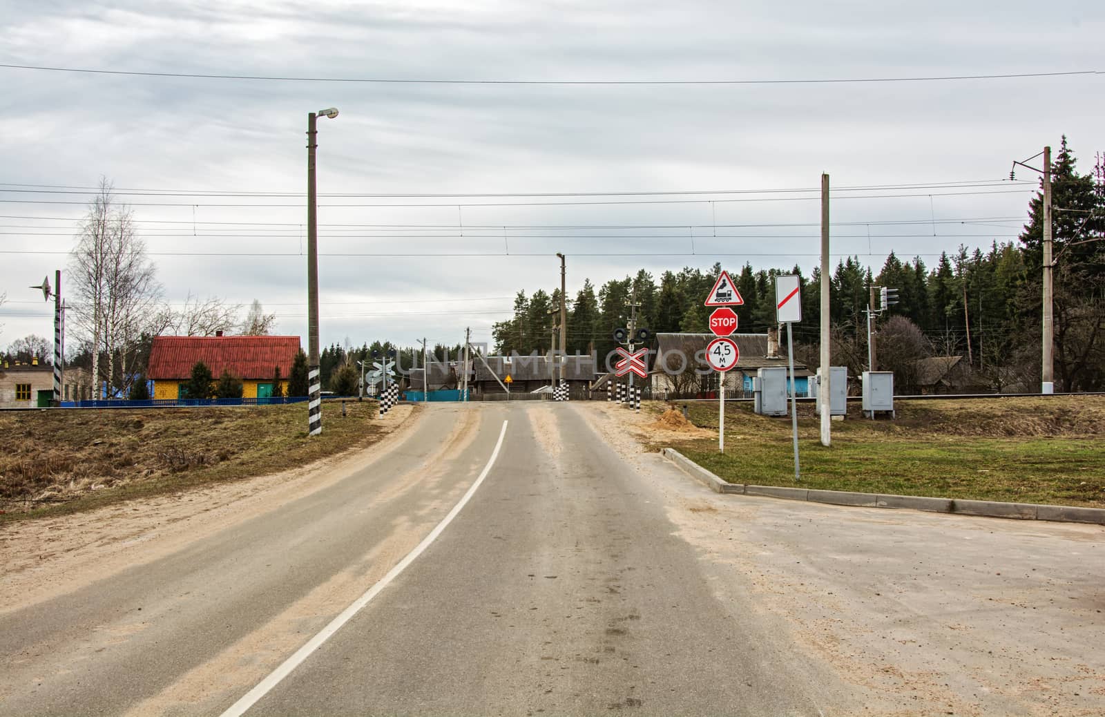 The road crosses the railway crossing