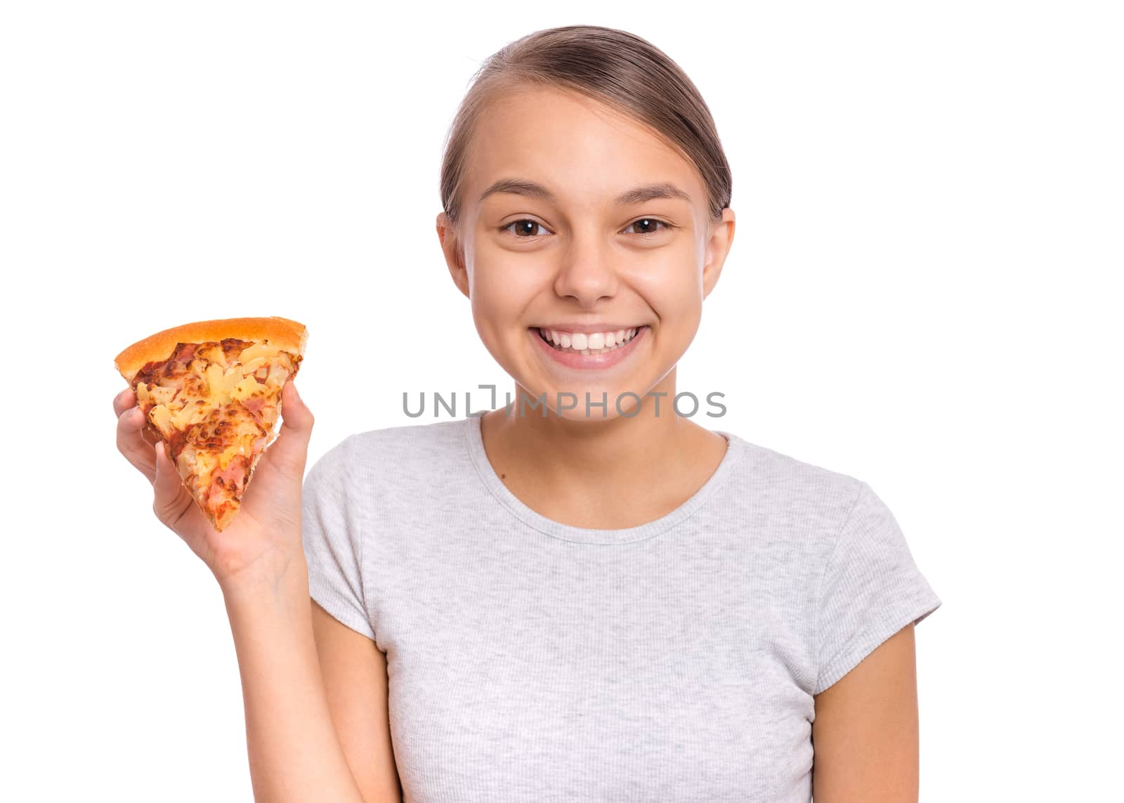 Happy beautiful young teen girl holds slice of pizza, isolated on white background