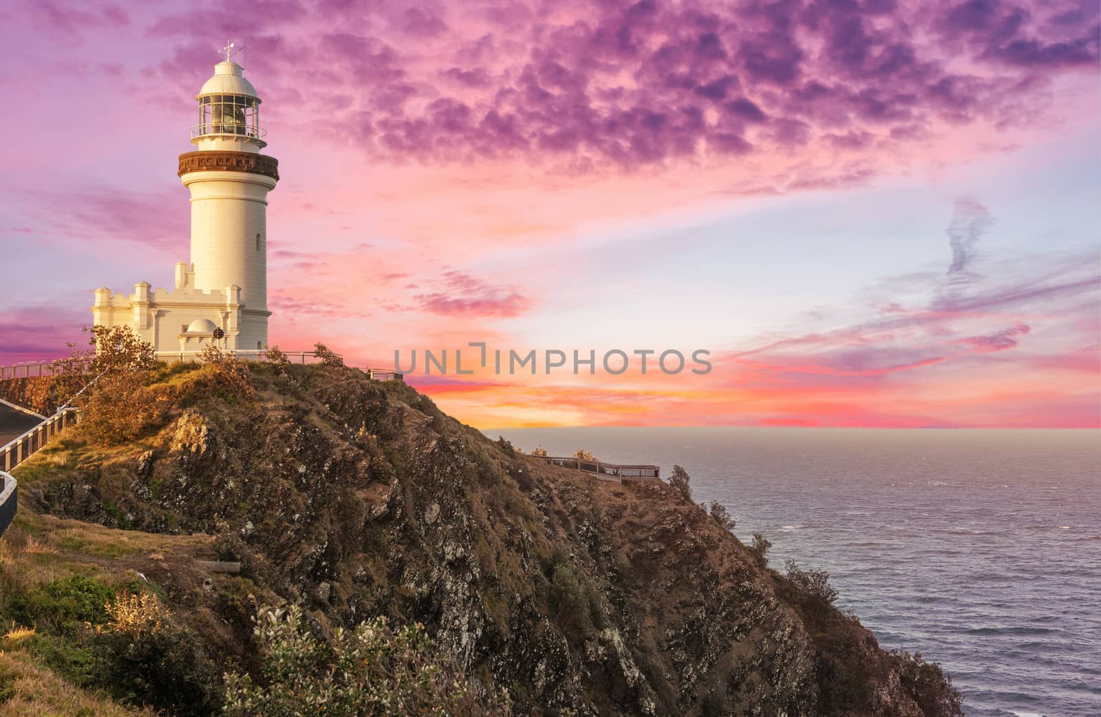 Cape Byron lighthouse in New South Wales in Australia at dramati by fyletto