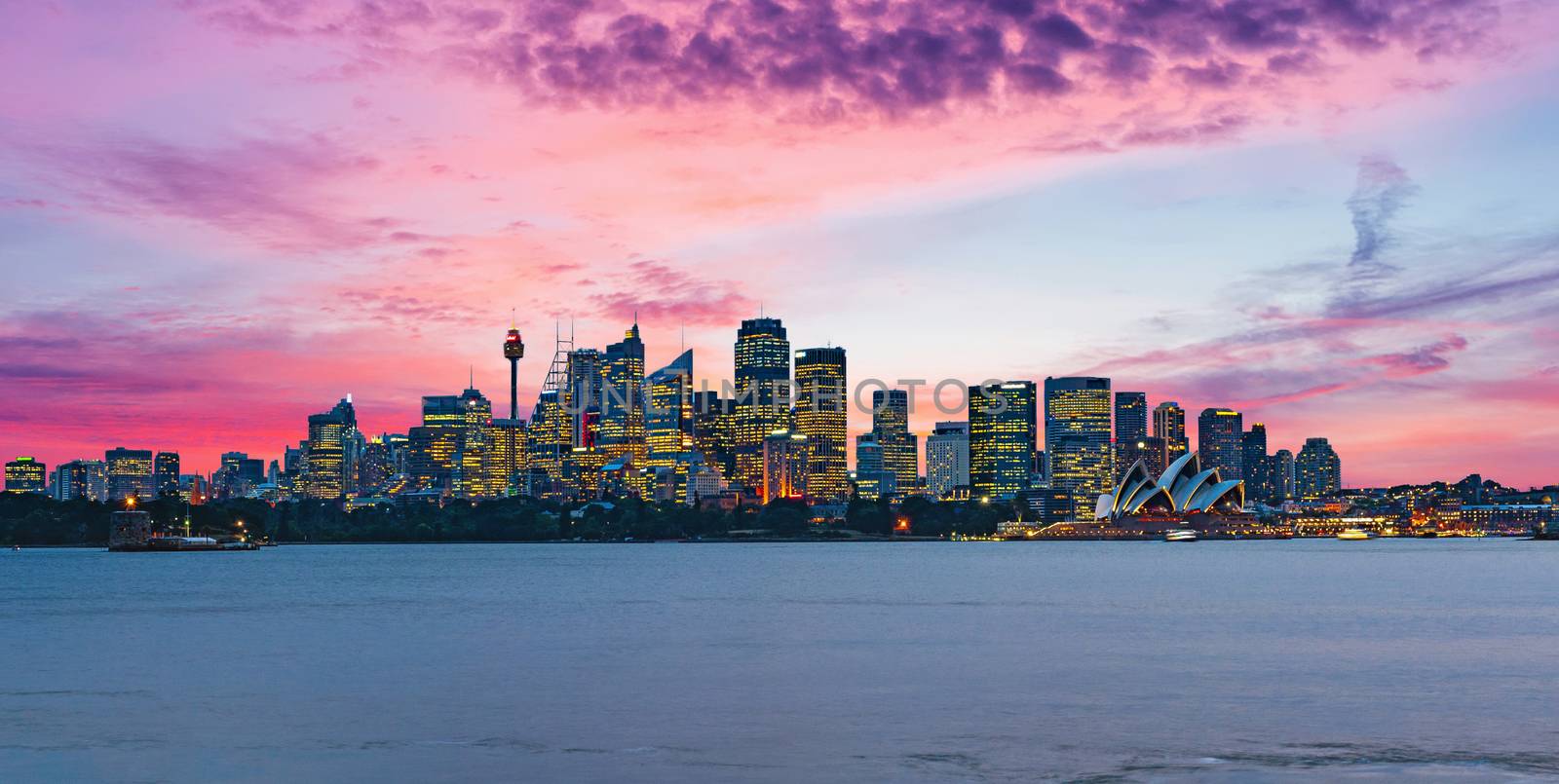 Beautiful dramatic sunset over Sydney skyline in Australia by fyletto