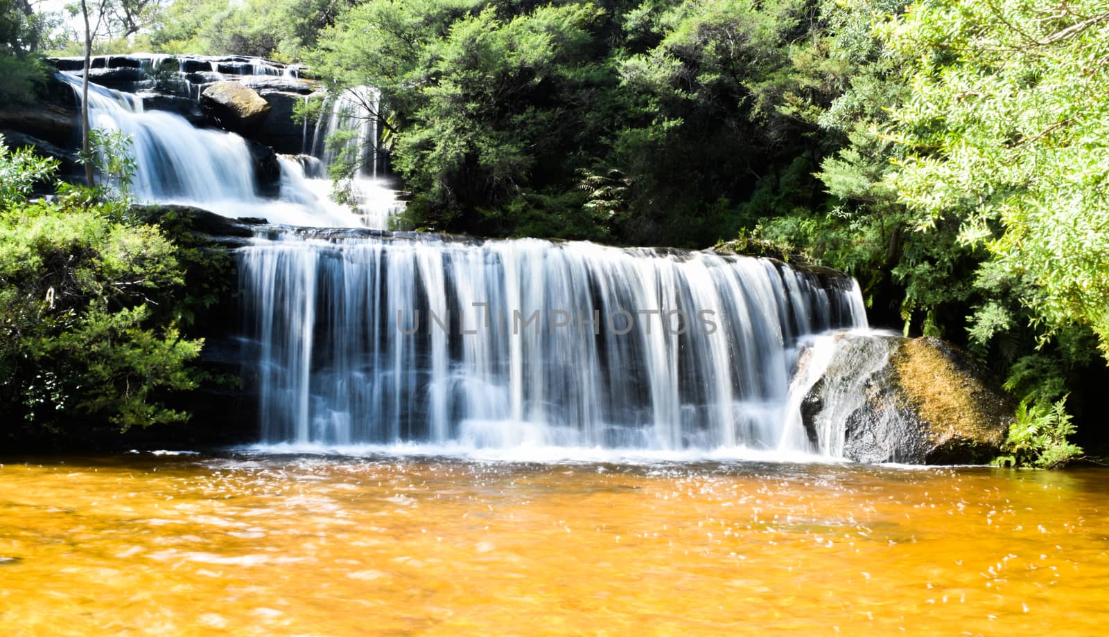 This was taken low shutter speed which can capture falling water with falling motion