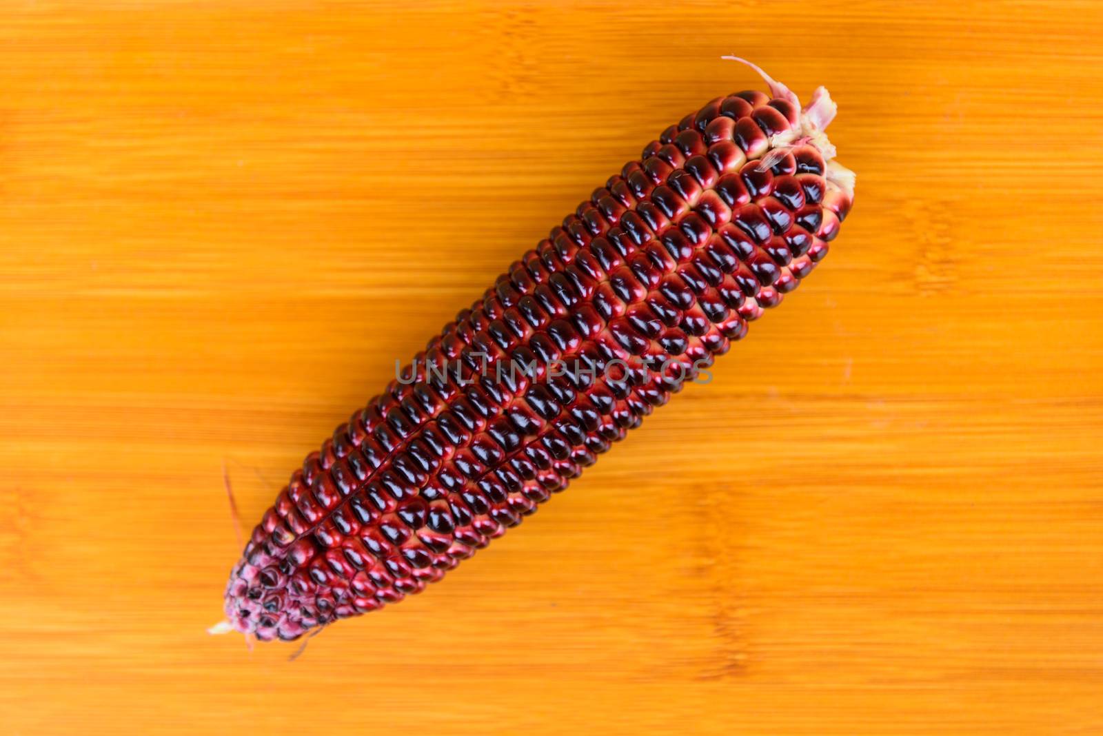 Closeup to Purple corn on wood table