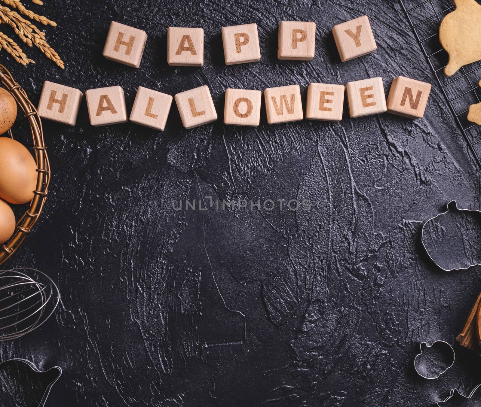 Design concept of top view layout of making Halloween cookies, preparing party, overhead, blank copy space.
