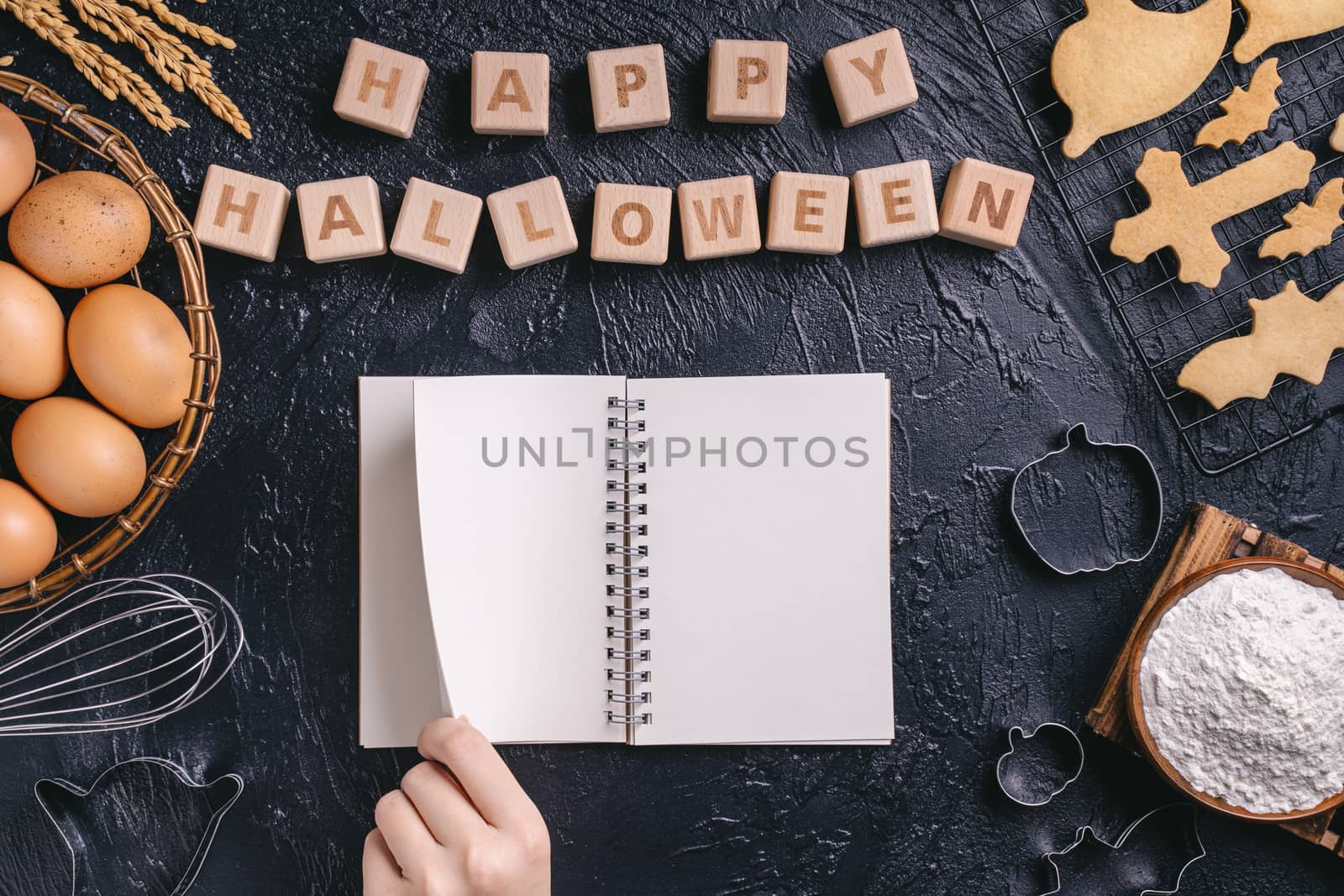 Design concept of top view layout of making Halloween cookies, preparing party, overhead, blank copy space.