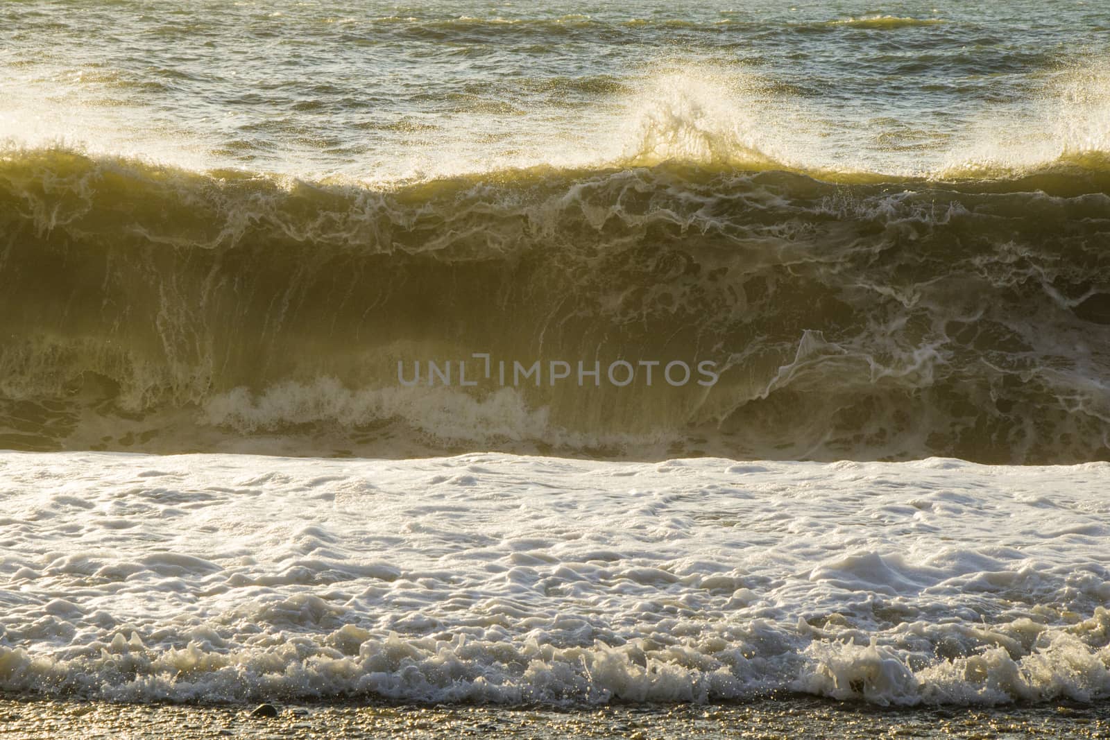 Stormy Black sea. Water background, stormy weather, waves and splashes in Batumi, Georgia. by Taidundua