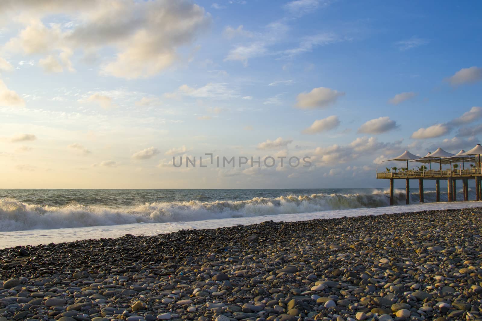 Stormy Black sea. Water background, stormy weather, waves and splashes in Batumi, Georgia. by Taidundua
