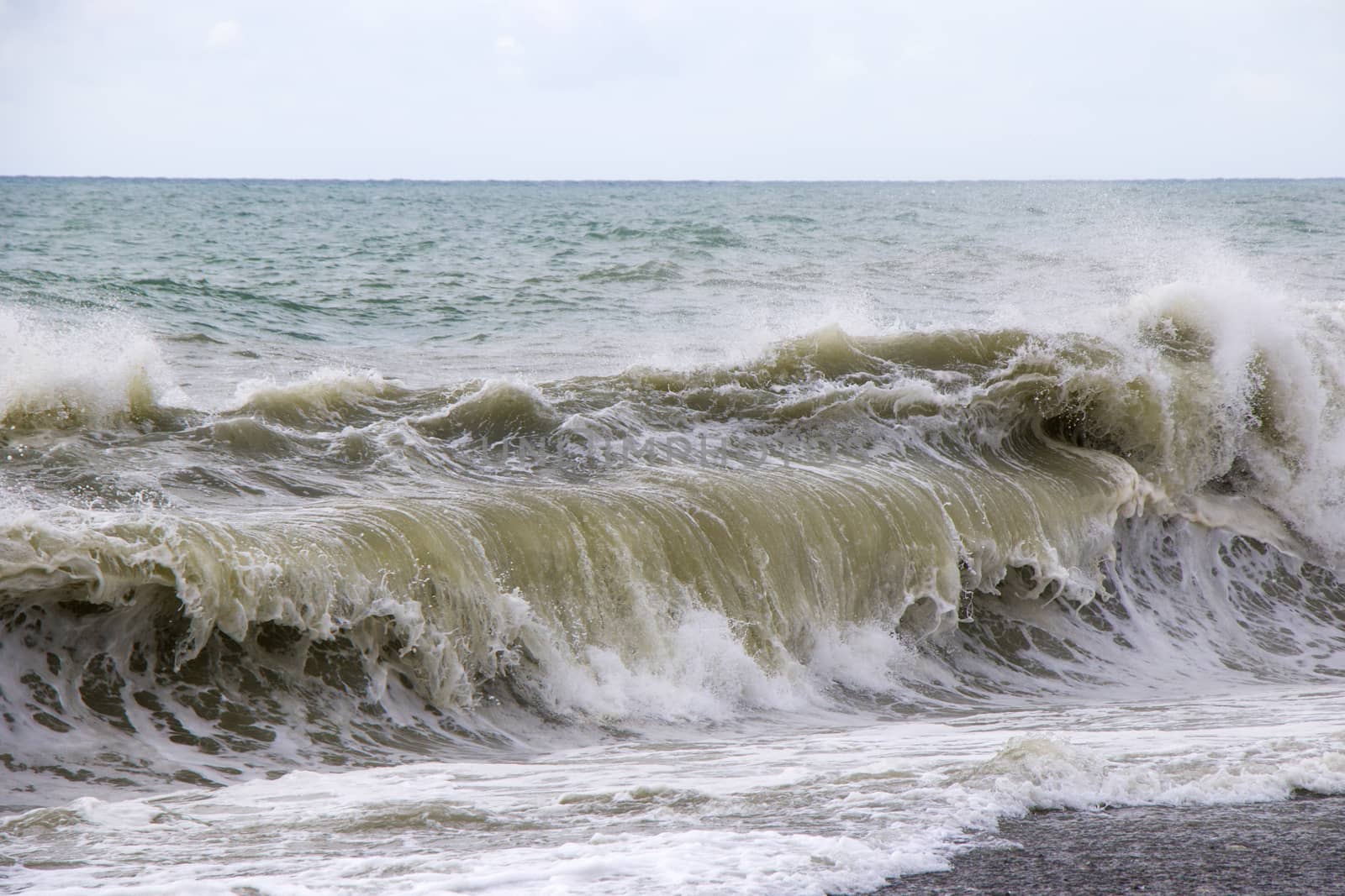 Stormy weather, waves and splashes in Batumi, Georgia. Stormy Black sea. by Taidundua