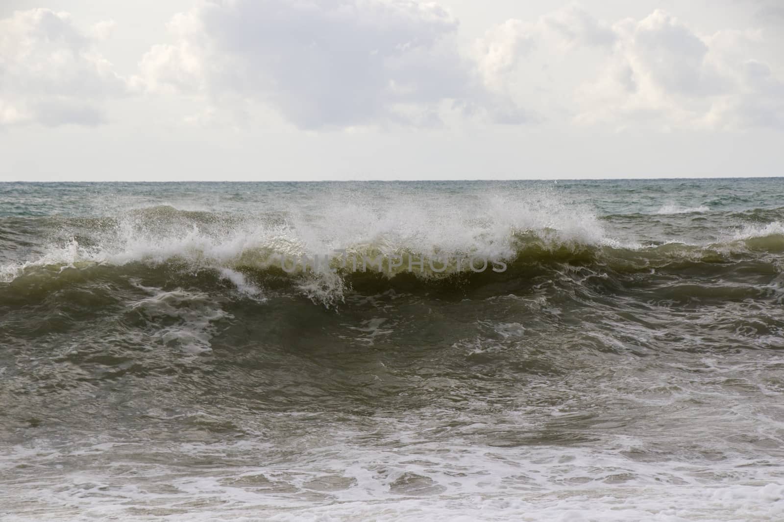 Stormy wheater, waves and splashes in Batumi, Georgia. Stormy Black sea. by Taidundua