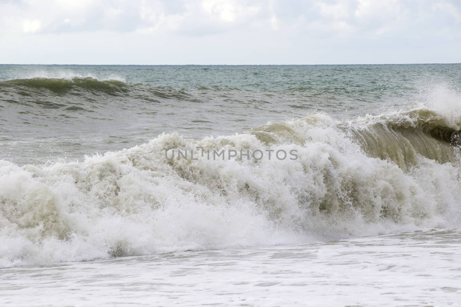 Stormy wheater, waves and splashes in Batumi, Georgia. Stormy Black sea. by Taidundua