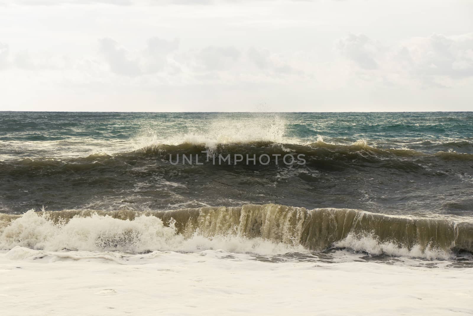 Stormy weather, waves and splashes in Batumi, Georgia. Stormy Black sea. by Taidundua
