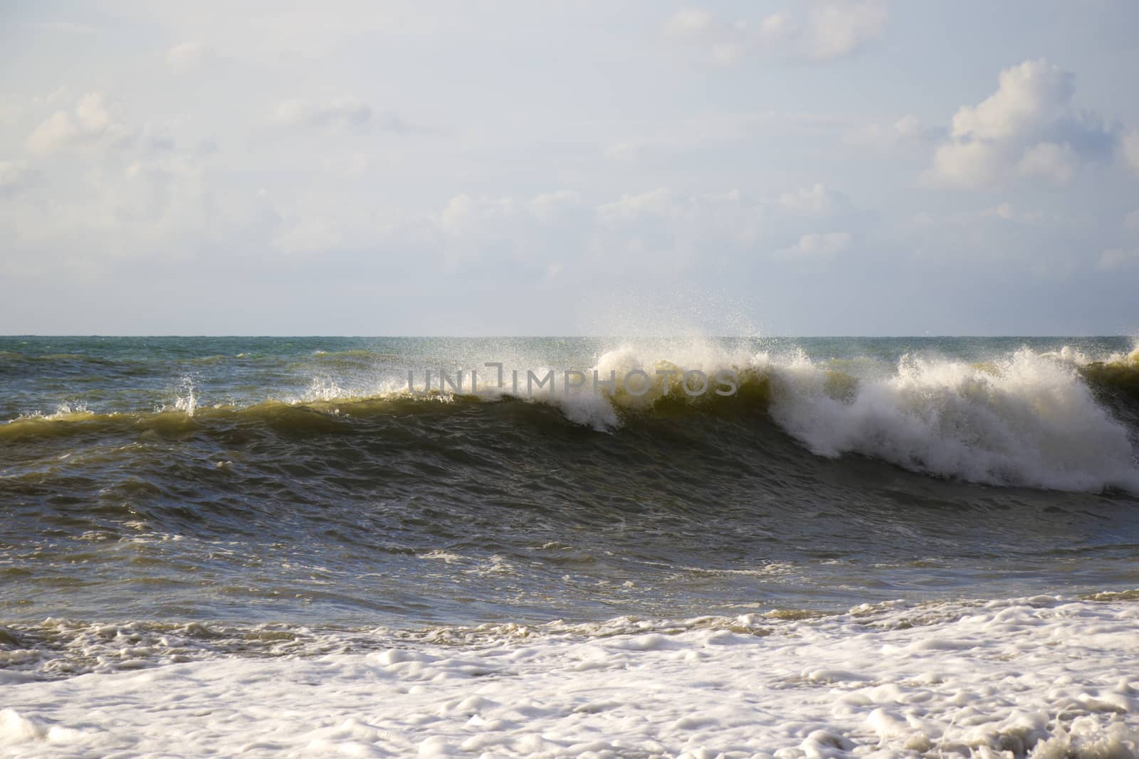 Stormy weather, waves and splashes in Batumi, Georgia. Stormy Black sea. by Taidundua