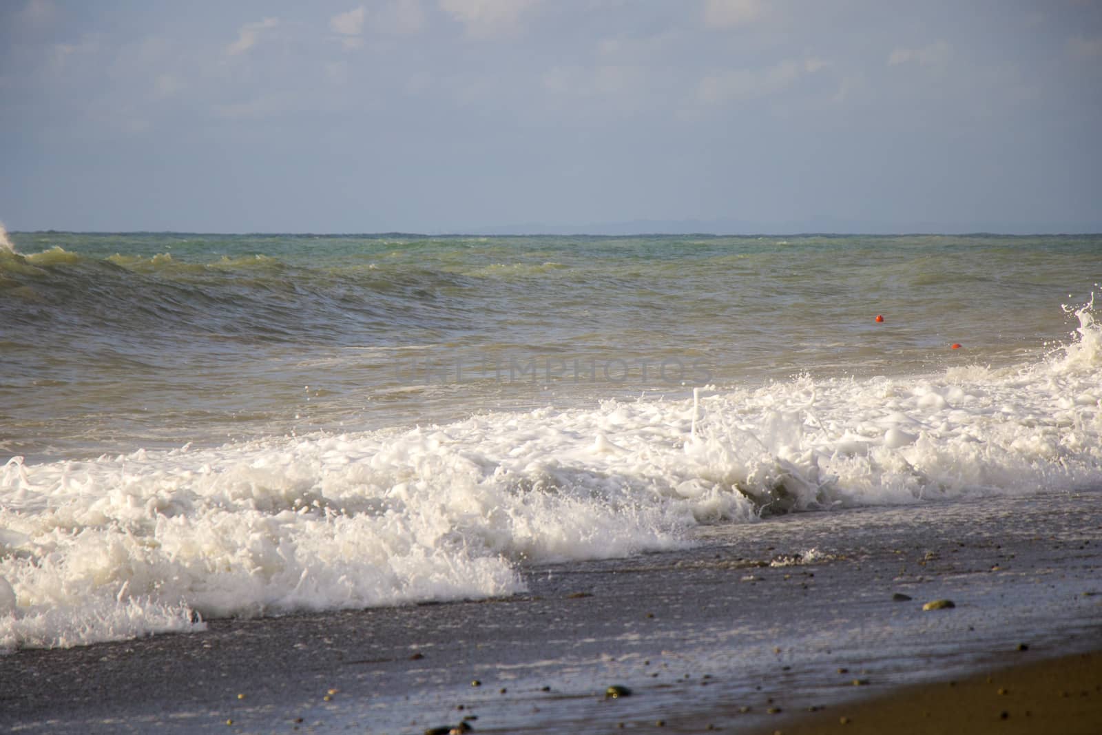 Stormy weather, waves and splashes in Batumi, Georgia. Stormy Black sea. by Taidundua